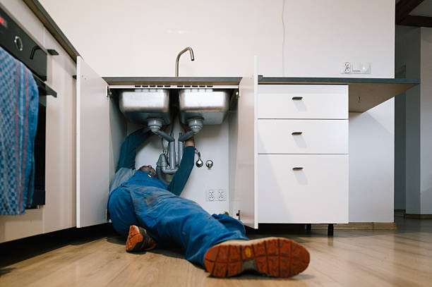 Professional Drain Cleaning technician working in Rainbow, CA